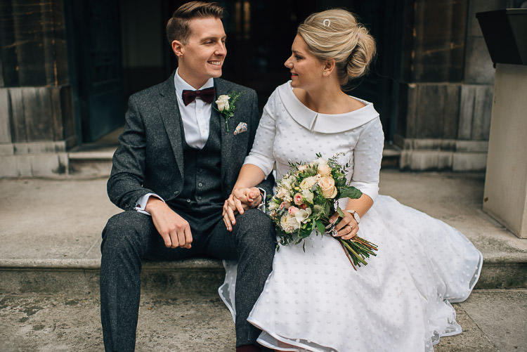 Bride Bridal Candy Anthony Polka Dot Peter Pan Collar Tea Length Groom Three Piece Suit Waistcoat Grey Tweed Burgundy Bow Tie Pocket Square Bouquet Chic Relaxed London Pub Wedding https://theshannons.photography/