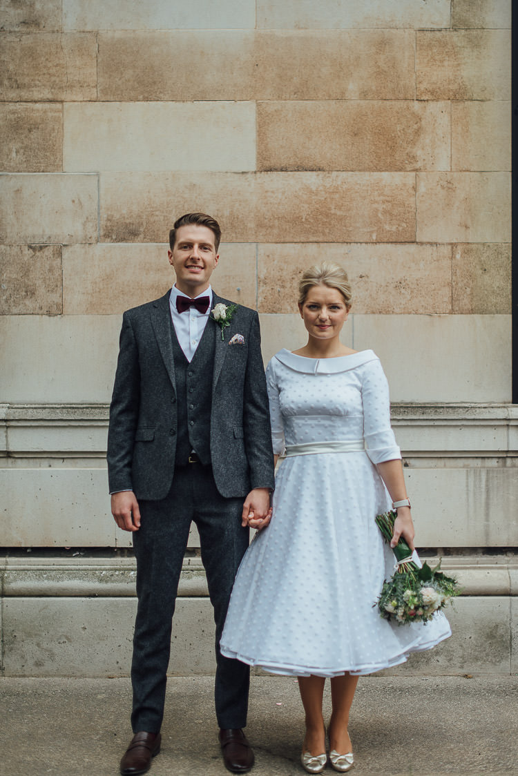 Bride Bridal Candy Anthony Polka Dot Peter Pan Collar Tea Length Groom Three Piece Suit Waistcoat Grey Tweed Burgundy Bow Tie Pocket Square Bouquet Chic Relaxed London Pub Wedding https://theshannons.photography/