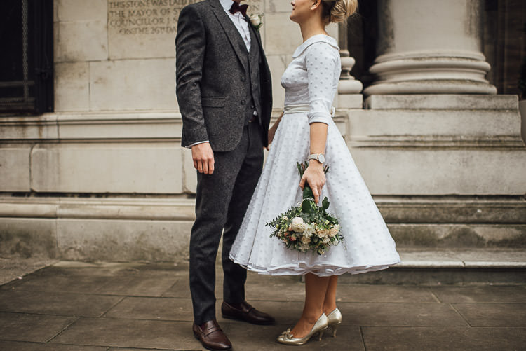 Bride Bridal Candy Anthony Polka Dot Peter Pan Collar Tea Length Groom Three Piece Suit Waistcoat Grey Tweed Burgundy Bow Tie Pocket Square Bouquet Chic Relaxed London Pub Wedding https://theshannons.photography/