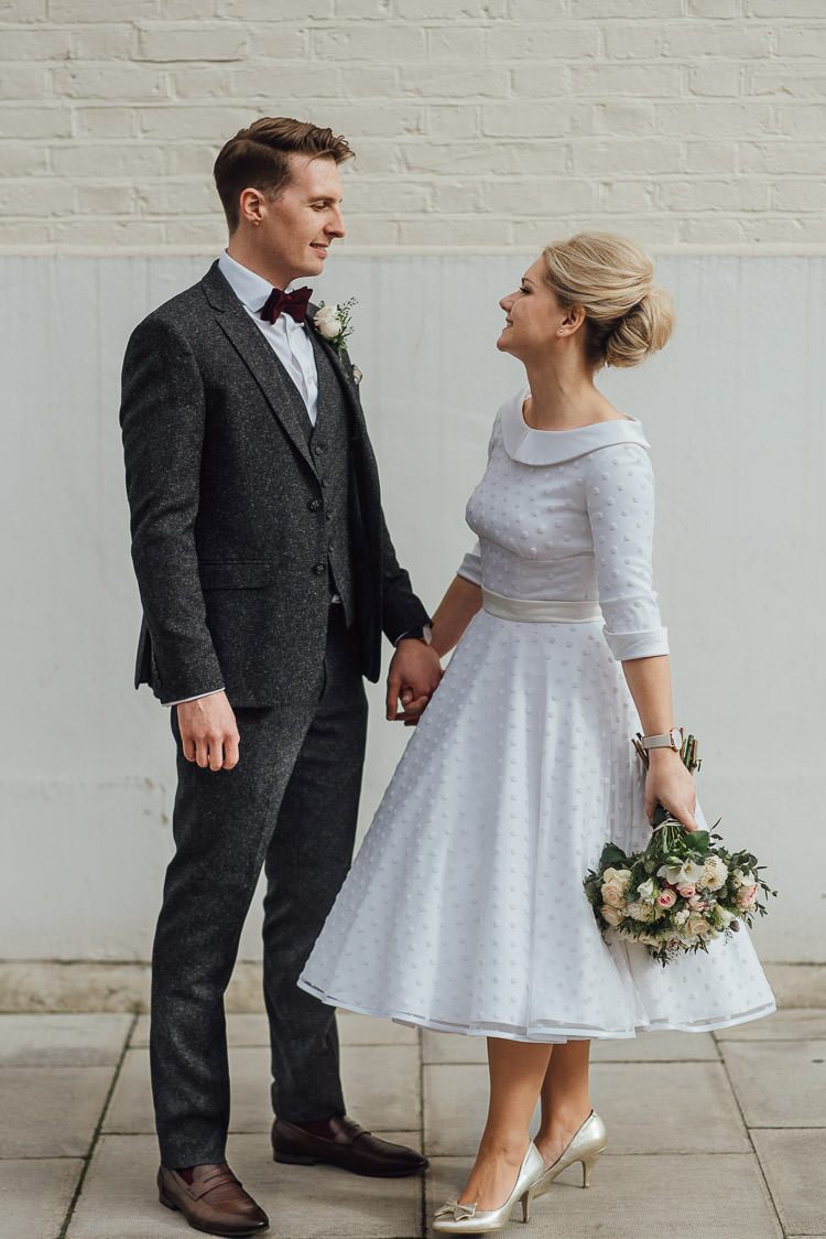 Bride Bridal Candy Anthony Polka Dot Peter Pan Collar Tea Length Groom Three Piece Suit Waistcoat Grey Tweed Burgundy Bow Tie Pocket Square Bouquet Chic Relaxed London Pub Wedding https://theshannons.photography/