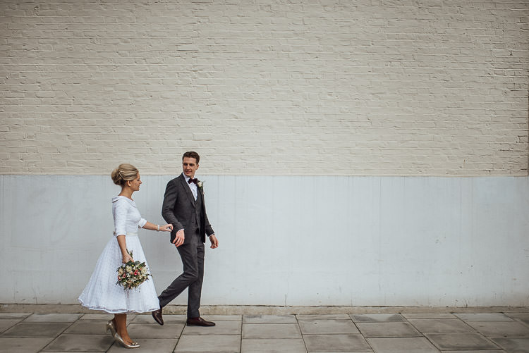 Bride Bridal Candy Anthony Polka Dot Peter Pan Collar Tea Length Groom Three Piece Suit Waistcoat Grey Tweed Burgundy Bow Tie Pocket Square Bouquet Chic Relaxed London Pub Wedding https://theshannons.photography/