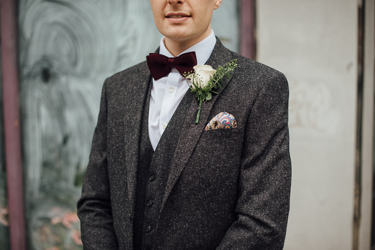 Groom Three Piece Suit Waistcoat Grey Tweed Burgundy Bow Tie Pocket Square Chic Relaxed London Pub Wedding https://theshannons.photography/