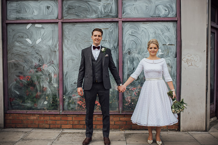 Bride Bridal Candy Anthony Polka Dot Peter Pan Collar Tea Length Groom Three Piece Suit Waistcoat Grey Tweed Burgundy Bow Tie Pocket Square Bouquet Chic Relaxed London Pub Wedding https://theshannons.photography/