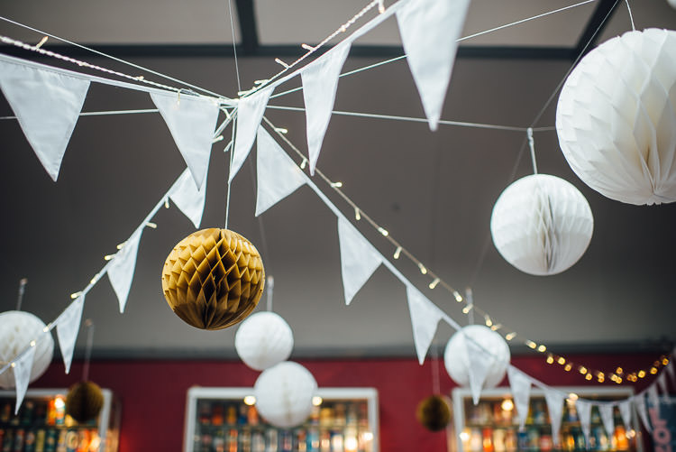 Bunting Paper Lanterns Fairy Lights Chic Relaxed London Pub Wedding https://theshannons.photography/
