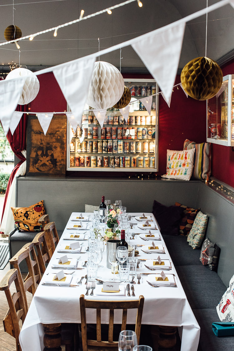 Bunting Fairy Lights Paper Lanterns Table Setting Chic Relaxed London Pub Wedding https://theshannons.photography/