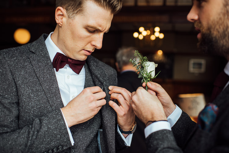 Groom Style Tweed Grey Three Piece Suit Waistcoat Bow Tie Burgundy Pocket Square Buttonhole Chic Relaxed London Pub Wedding https://theshannons.photography/