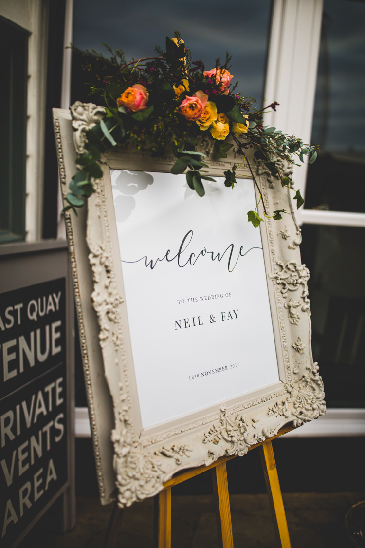 Welcome Sign Board Frame Foliage Floral Flowers Colourful Fun Cosy Rainy Sea Wedding http://www.livvy-hukins.co.uk/