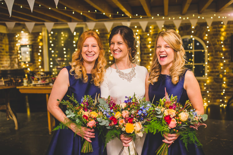 Bridesmaids Midnight Blue Bunting Pea Lights Fairy Lights Bride Bridal Floor Length T Shirt Neckline Short Sleeves Multicolour Wild Flower Bouquet Colourful Fun Cosy Rainy Sea Wedding http://www.livvy-hukins.co.uk/