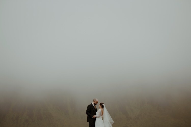 Bride Groom Destination Elopement Nordic Outdoor Fog Field Cliff Coast Sea Minimalist Style | Intimate Adventurous Emotional Iceland Wedding http://www.thecurries.co/
