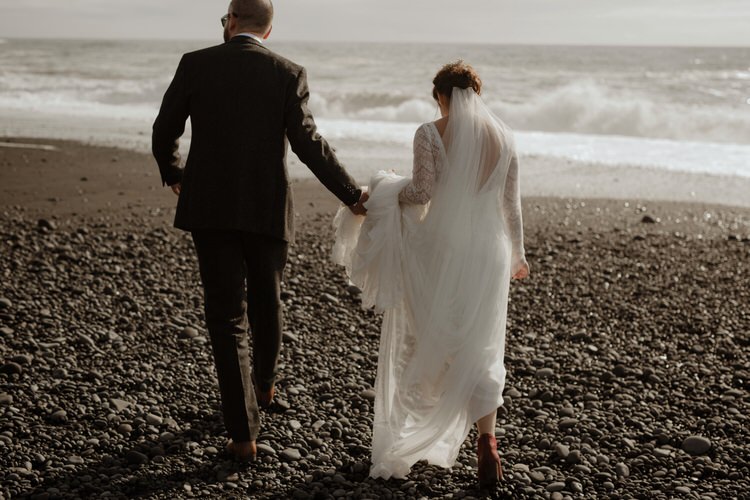 Bride Groom Destination Elopement Nordic Waterfall Cliff Coast Sea Minimalist Style | Intimate Adventurous Emotional Iceland Wedding http://www.thecurries.co/