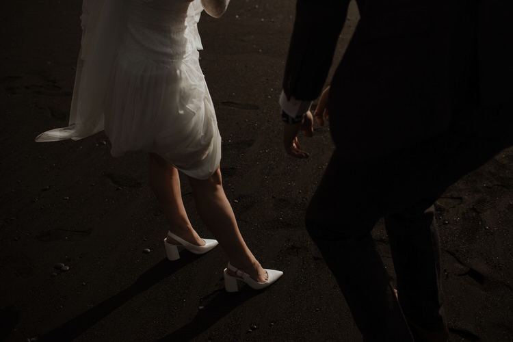 Bride Groom Destination Elopement Nordic Waterfall Cliff Coast Sea Minimalist Style Shoes Sand | Intimate Adventurous Emotional Iceland Wedding http://www.thecurries.co/