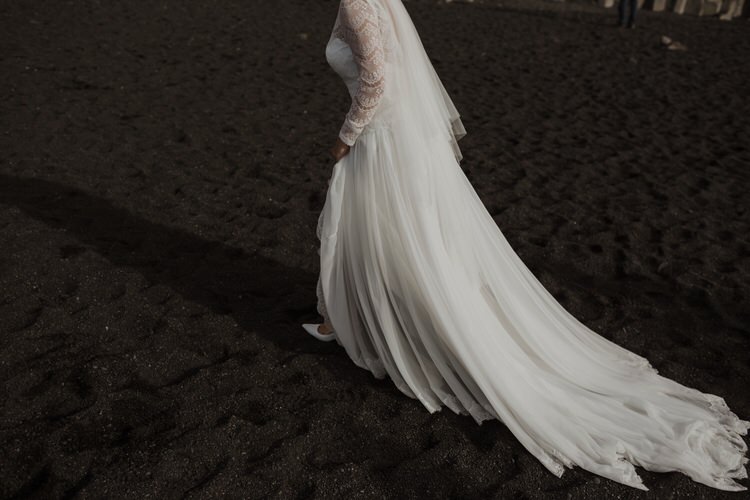 Bride Groom Destination Elopement Nordic Waterfall Cliff Coast Sea Minimalist Style Shoes Dark Sand | Intimate Adventurous Emotional Iceland Wedding http://www.thecurries.co/