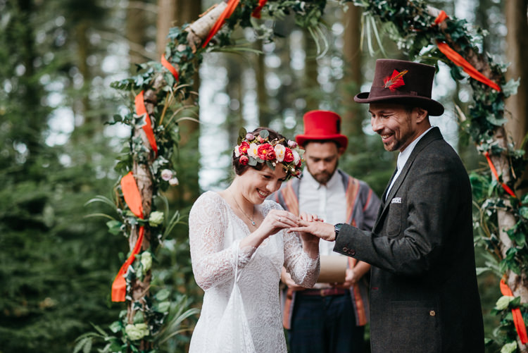 Bride Bridal Vintage Lace Dress Long Sleeved Flower Crown Bouquet White Stuff Groom No Tie Waistcoat Three Piece Suit Top Hat Tweed Feather Flower Foliage Arch Ceremony Ribbon Folky Woodland Adventure Wedding https://elainewilliamsphoto.com/