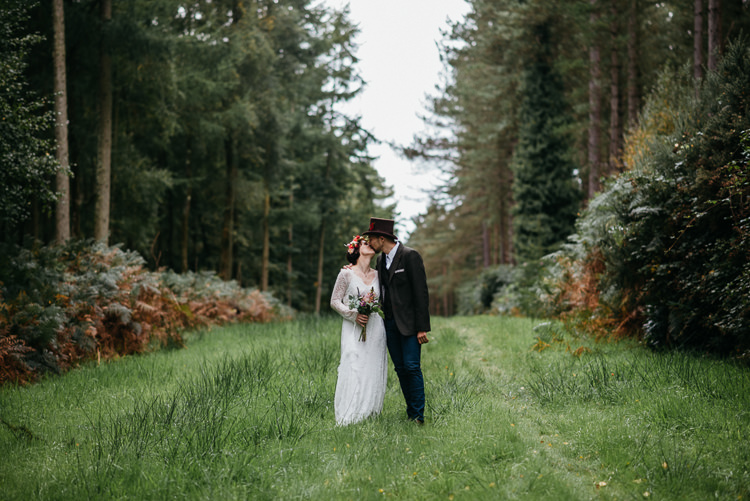 Bride Bridal Vintage Lace Dress Long Sleeved Flower Crown Bouquet White Stuff Groom No Tie Waistcoat Three Piece Suit Top Hat Tweed Folky Woodland Adventure Wedding https://elainewilliamsphoto.com/