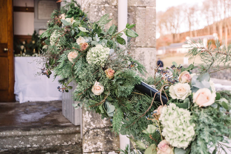 Foliage Floral Flower Garland Bannister Peach Roses Enchanted Magical Snowy Wedding https://www.thegibsonsphotography.co.uk/