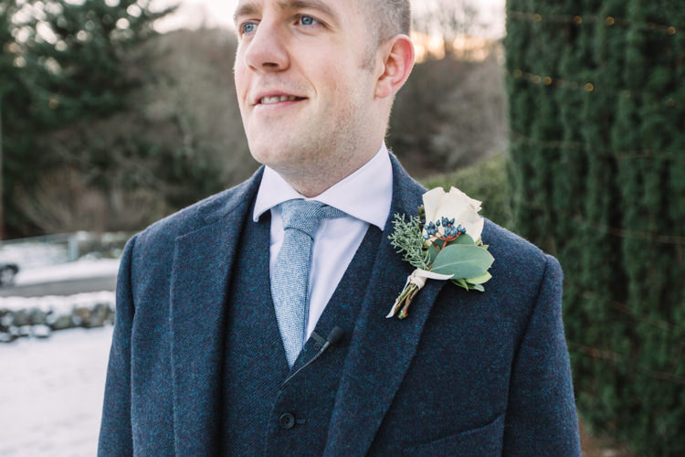 Tweed Groom Three Piece Waistcoat Buttonhole Blue Tie Enchanted Magical Snowy Wedding https://www.thegibsonsphotography.co.uk/