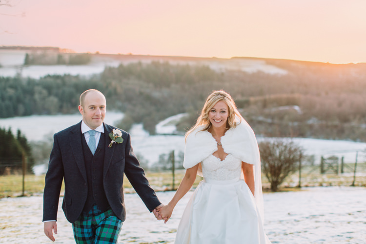 Bride Bridal Sweetheart Neckline Hair Piece Lace A Line Faux Fur Stole Cape Tartan Trousers Groom Three Piece Waistcoat Tweed Jacket Enchanted Magical Snowy Wedding https://www.thegibsonsphotography.co.uk/