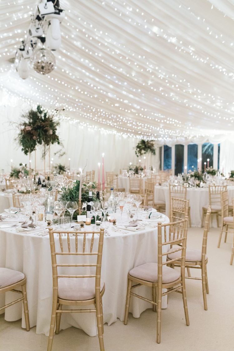 Starry Fairy Lights Marquee Pastel Candlesticks Pedestal Flowers Enchanted Magical Snowy Wedding https://www.thegibsonsphotography.co.uk/