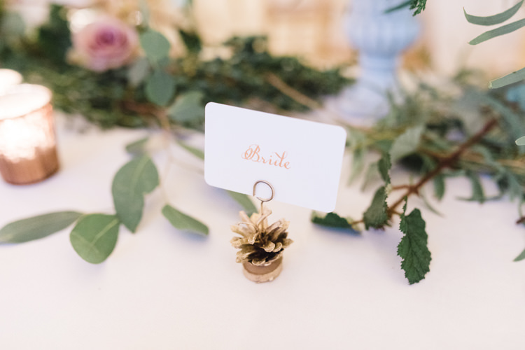 Place Card Place Setting Gold Fir Cone Bride Enchanted Magical Snowy Wedding https://www.thegibsonsphotography.co.uk/