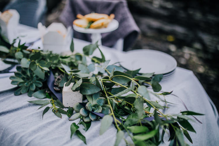 Tablescape Decor Grey White Greeenery Candles Foliage Fabric Ocean Clifftop Elopement Wedding Ideas North Wales https://www.claracooperphotography.com/