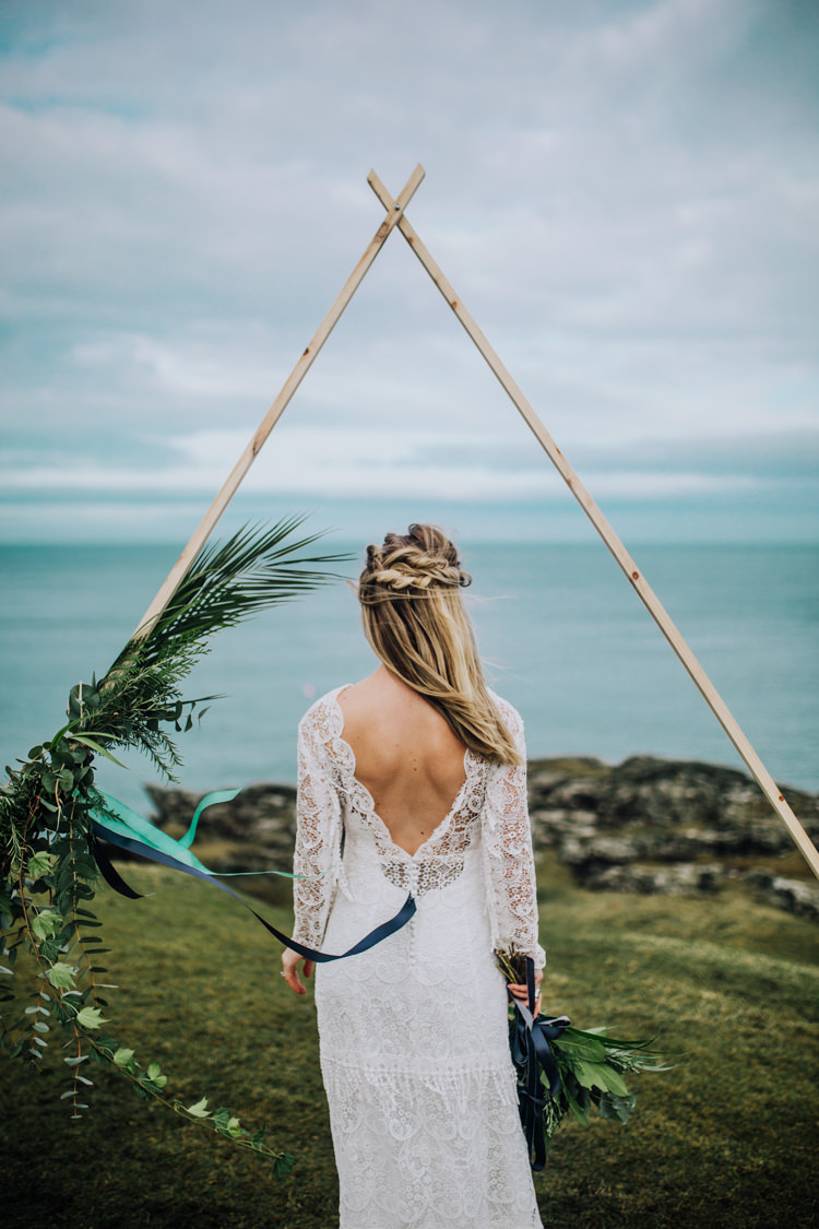 Dress Lace Sleeves Bride Bridal Hair Long Ocean Clifftop Elopement Wedding Ideas North Wales https://www.claracooperphotography.com/