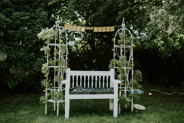 Field Outdoor Garden Tipi Hippie Just Married Flower Arch | Happy Outdoor Forest Mustard Yellow Wedding http://suzi-photography.com/