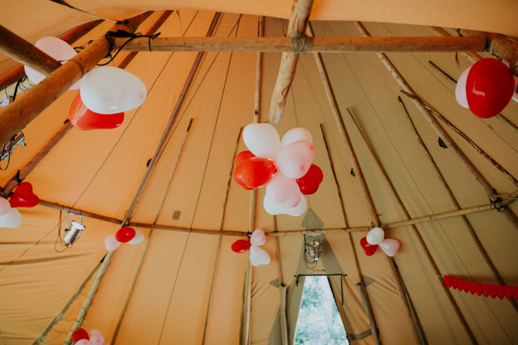 Field Outdoor Garden Woodland Hippie Summer Giant Tipi Heart Balloons | Happy Outdoor Forest Mustard Yellow Wedding http://suzi-photography.com/