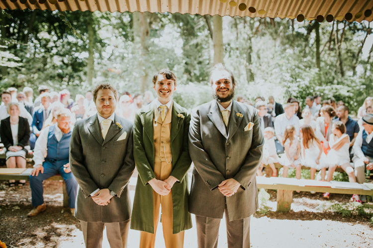 Field Outdoor Garden Woodland Hippie Summer Tipi Ceremony Mustard Green Suit Groom | Happy Outdoor Forest Mustard Yellow Wedding http://suzi-photography.com/