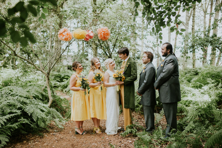 Field Outdoor Garden Tipi Hippie Bride Groom Bridesmaids Groomsmen Paper Pompoms Flower Arch | Happy Outdoor Forest Mustard Yellow Wedding http://suzi-photography.com/