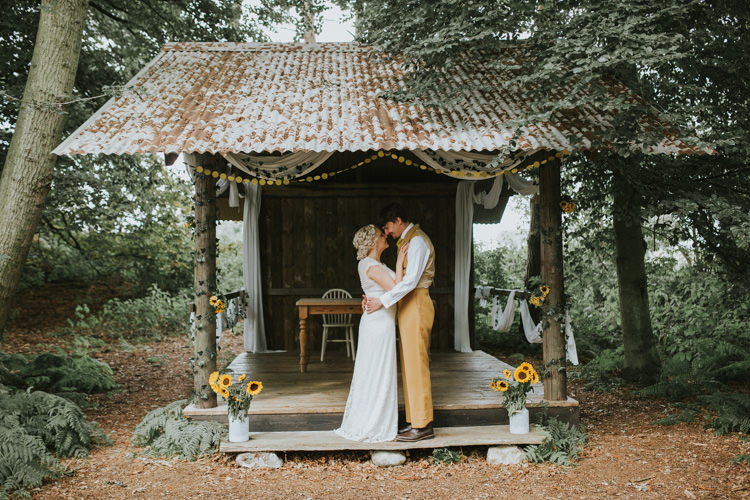Field Outdoor Garden Woodland Hippie Summer Ceremony Hut Bride Groom Hush Venue | Happy Outdoor Forest Mustard Yellow Wedding http://suzi-photography.com/