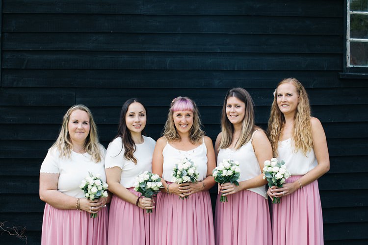 Bridesmaids Pink Skirts White Tops Flowers Bouquets Rustic Homespun Country Chapel Barn Wedding Sussex http://www.olegssamsonovsphotography.com/