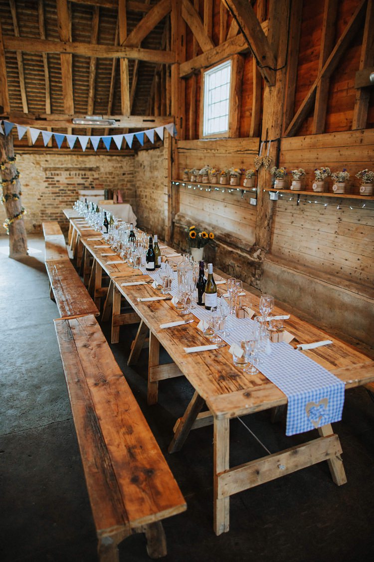 Long Wooden Tables Bunting Rustic Homespun Country Chapel Barn Wedding Sussex http://www.olegssamsonovsphotography.com/