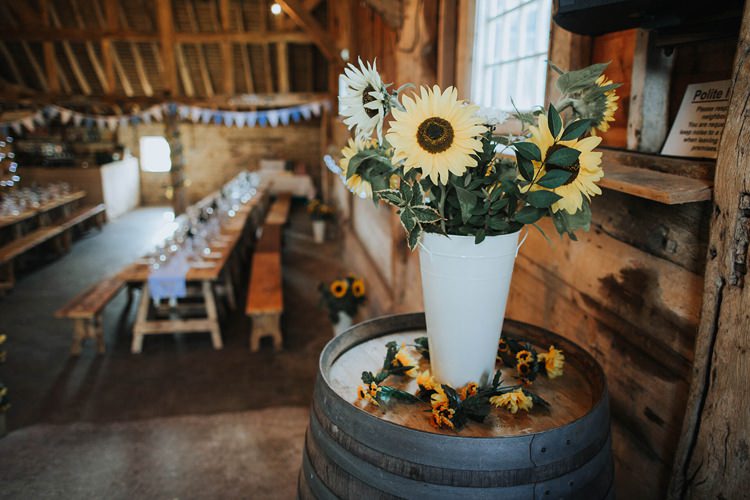 Sunflowers Vase Barrel Rustic Homespun Country Chapel Barn Wedding Sussex http://www.olegssamsonovsphotography.com/