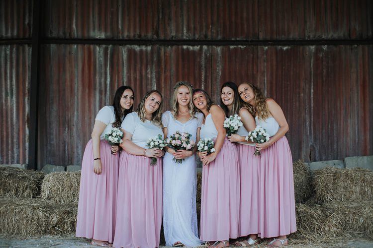 Bridesmaids Pink Skirts White Tops Flowers Bouquets Rustic Homespun Country Chapel Barn Wedding Sussex http://www.olegssamsonovsphotography.com/