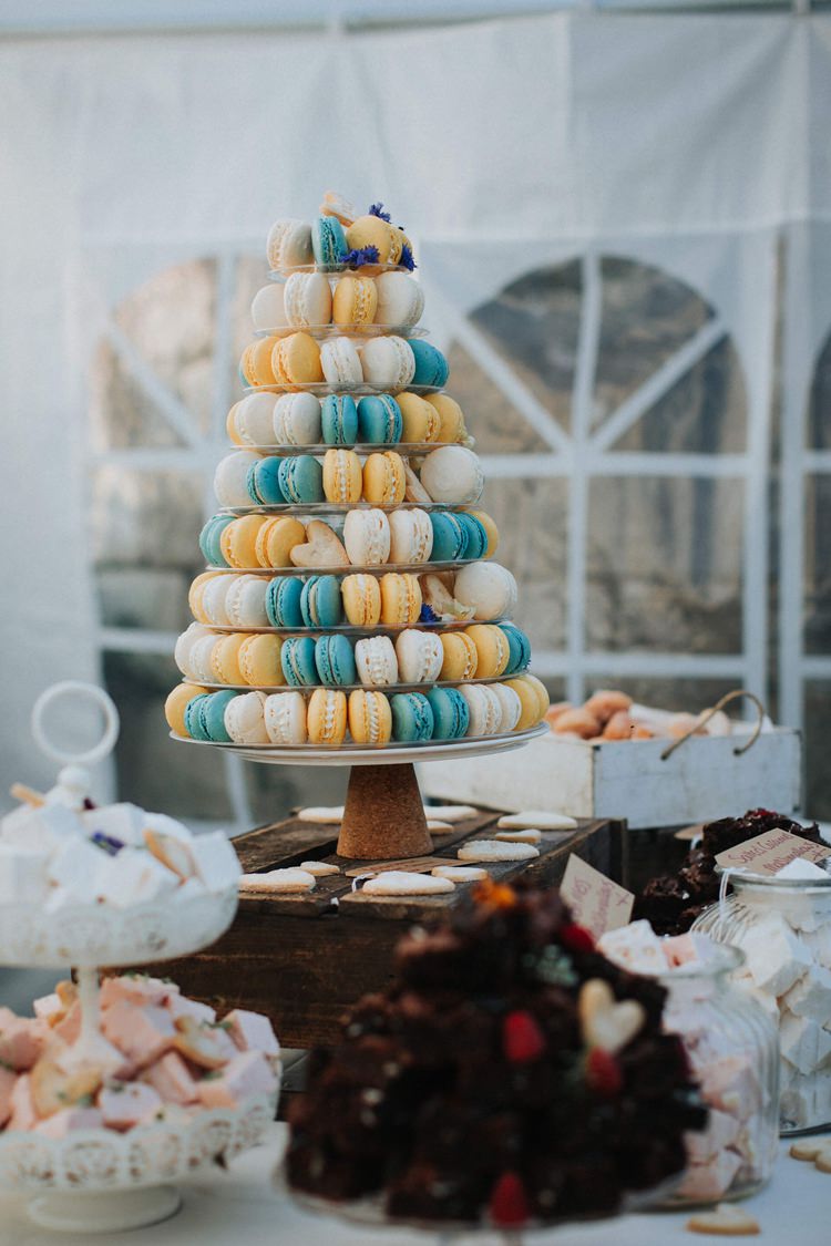 Macaron Tower Blue Yellow Rustic Homespun Country Chapel Barn Wedding Sussex http://www.olegssamsonovsphotography.com/