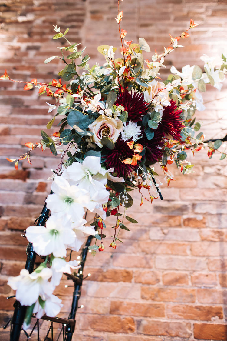 Backdrop Arch Flowers Ceremony Autumn Packington Moor Wedding Staffordshire Farm Barn Burgundy http://kathrynedwardsphotography.com/