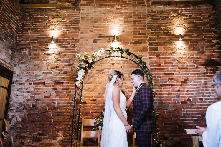 Arch Backdrop Flowers Autumn Packington Moor Wedding Staffordshire Farm Barn Burgundy http://kathrynedwardsphotography.com/
