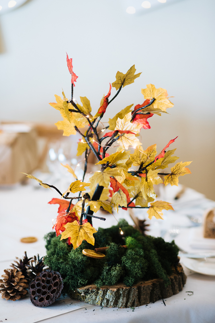 Tree Leaves Decor Centrepiece Moss Log Autumn Packington Moor Wedding Staffordshire Farm Barn Burgundy http://kathrynedwardsphotography.com/