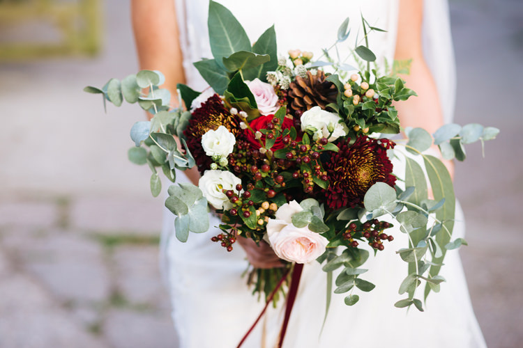 Bouquet Flowers Bride Bridal Rose Pinecone Berries Autumn Packington Moor Wedding Staffordshire Farm Barn Burgundy http://kathrynedwardsphotography.com/