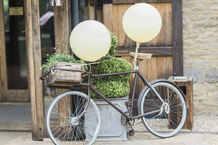 Bicycle Ballons Decor Darling Fresh Bohemian Barn Wedding https://razia.photography/
