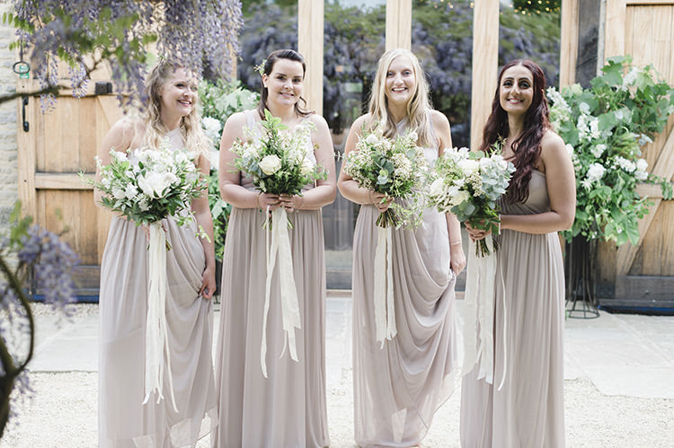 Bridesmaid Dresses Bouquets Ribbons Darling Fresh Bohemian Barn Wedding https://razia.photography/