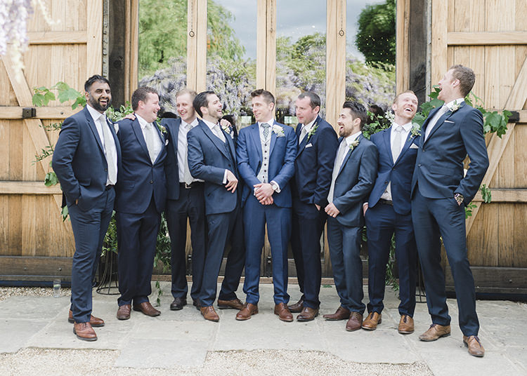 Groom Groomsmen Navy Suits Tan Darling Fresh Bohemian Barn Wedding https://razia.photography/