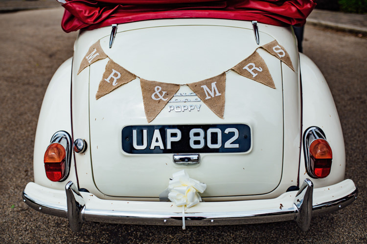 Transport Car Morris Minor Mr & Mrs Bunting Hessian Boho DIY Secret Garden Wedding https://bibandtuckerphotography.co.uk/