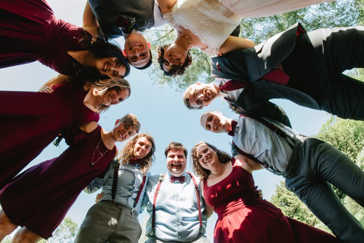 Outdoor Field Forest Wild Nature Marquee Tipi Bride Groom Bridesmaids Groomsmen Group Burgundy Dresses Braces | Breathtaking Secluded Back Garden Open Sided Tent Wedding Vermont https://kickasscouples.com/