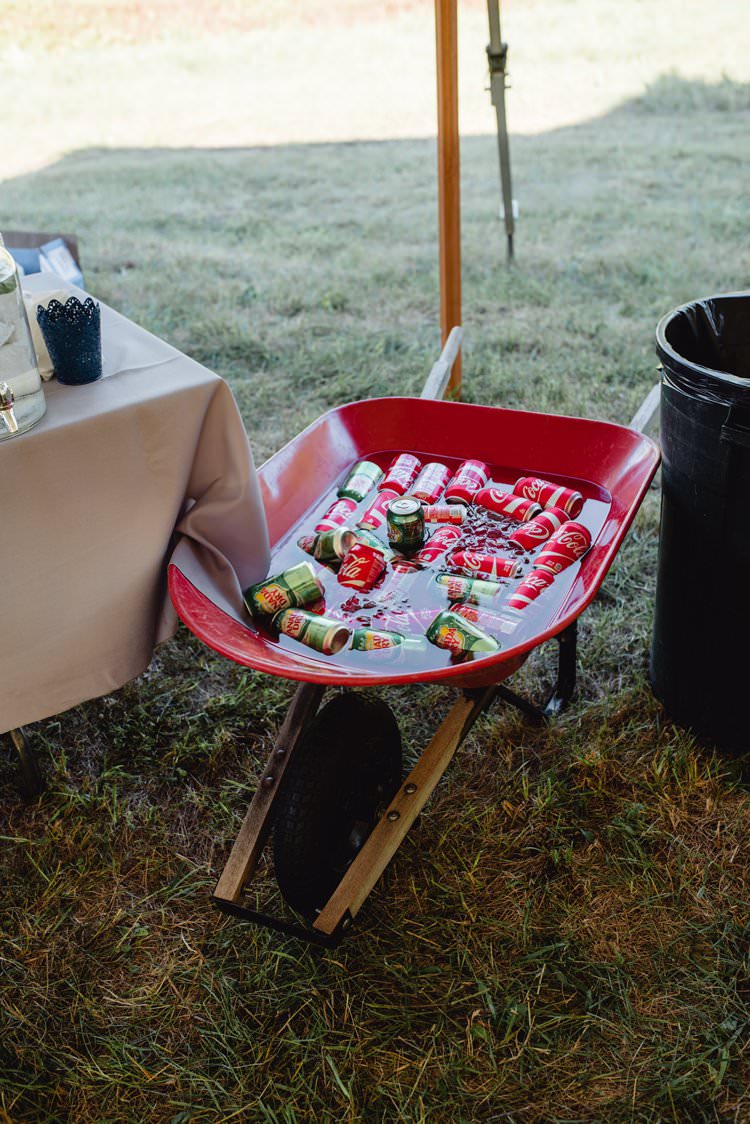 Outdoor Field Forest Wild Nature Marquee Tipi Wheelbarrow Cans Beers Drinks Rustic | Breathtaking Secluded Back Garden Open Sided Tent Wedding Vermont https://kickasscouples.com/