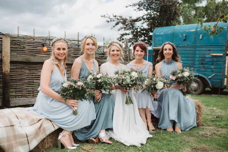 Blue Grey Mismatched Bridesmaid Dresses Bouquets Greenery Foliage Ribbon Flower Crowns Natural Country Garden Hand Crafted Wedding https://emilytylerphotography.com/