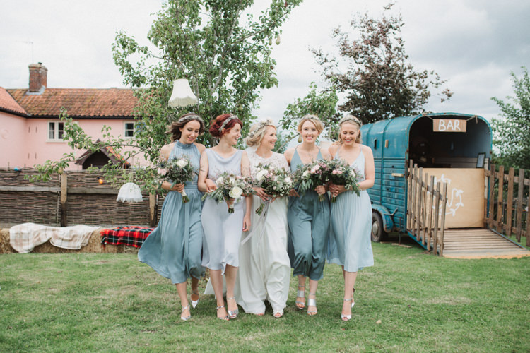 Blue Grey Mismatched Bridesmaid Dresses Bouquets Greenery Foliage Ribbon Flower Crowns Natural Country Garden Hand Crafted Wedding https://emilytylerphotography.com/