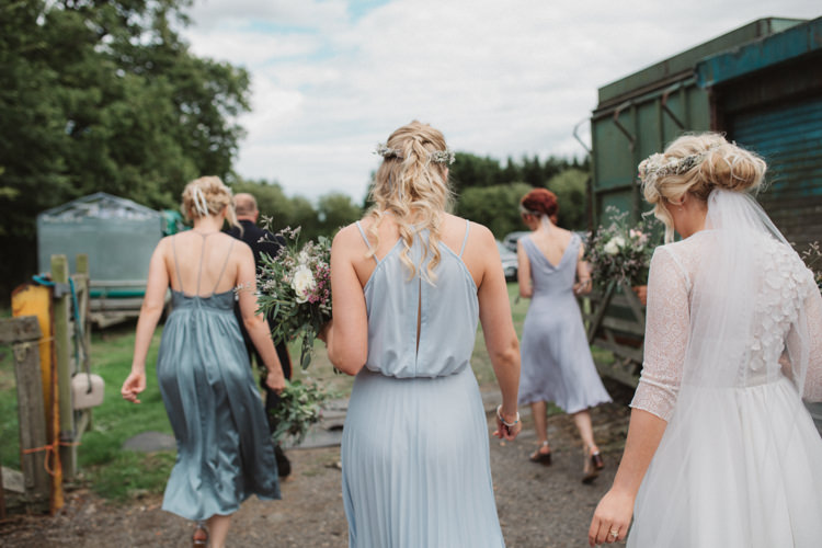 Blue Grey Mismatched Bridesmaid Dresses Bouquets Greenery Foliage Ribbon Flower Crowns Natural Country Garden Hand Crafted Wedding https://emilytylerphotography.com/
