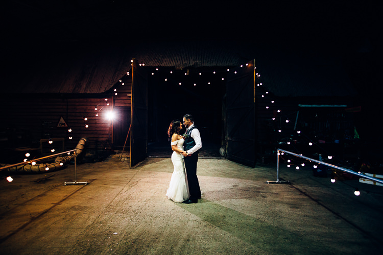 First Dance Edgy Raw Industrial Barn Wedding Ideas Greenery Festoon Lights http://www.two-d.co.uk/