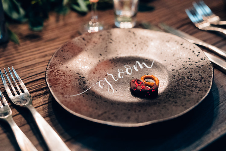 Place Name Setting Black Plates Calligraphy Edgy Raw Industrial Barn Wedding Ideas Greenery Festoon Lights http://www.two-d.co.uk/